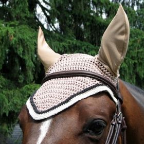 Horse with a fly bonnet on